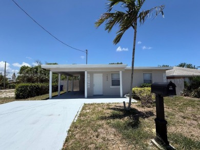 Beach Home For Sale in Riviera Beach, Florida