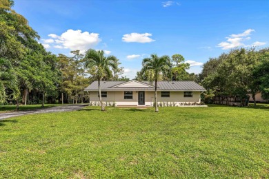 Beach Home For Sale in Palm Beach Gardens, Florida