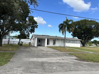 Beach Home For Sale in Palm Springs, Florida