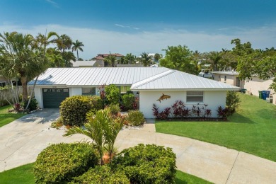 Beach Home For Sale in Holmes Beach, Florida