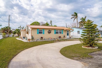 Beach Home For Sale in Holmes Beach, Florida