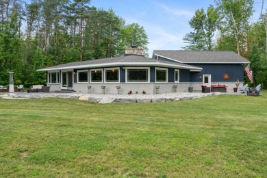 Beach Home For Sale in Brutus, Michigan