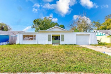 Beach Home For Sale in Holiday, Florida