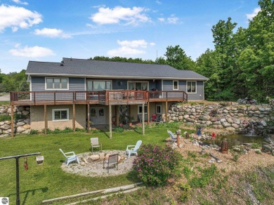 Beach Home For Sale in Kewadin, Michigan