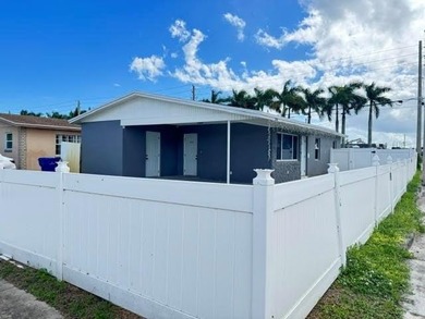 Beach Home Active Under Contract in Riviera Beach, Florida