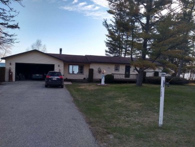 Beach Home For Sale in Cheboygan, Michigan