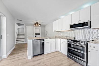 Beach Townhome/Townhouse For Sale in Lake Clarke Shores, Florida