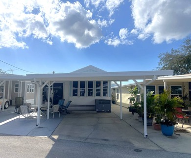 Beach Home For Sale in Holiday, Florida