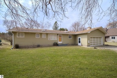 Wonderful one floor living in desired location that feels - Beach Home for sale in Manistee, Michigan on Beachhouse.com