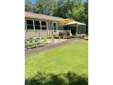 Beach Home For Sale in Brimley, Michigan