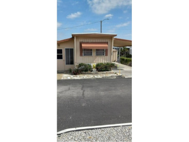 Beach Home For Sale in Tarpon Springs, Florida