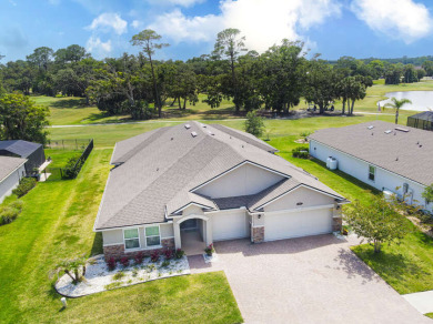 GOLF LIFE!! Located on Palm Harbor Golf Club this 4/3 home - Beach Home for sale in Palm Coast, Florida on Beachhouse.com