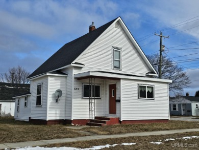 This 4 bedroom, 1 bath home is located on Manistique Avenue - Beach Home for sale in Manistique, Michigan on Beachhouse.com