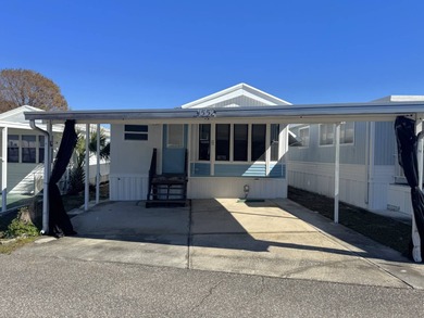 Beach Home For Sale in Holiday, Florida