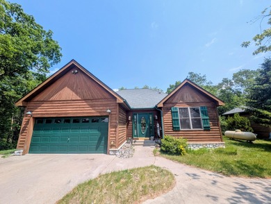 Beach Home For Sale in Oscoda, Michigan