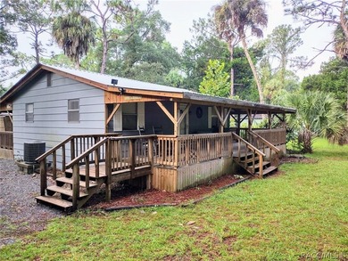 Beach Home For Sale in Yankeetown, Florida