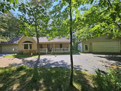 Beach Home For Sale in Ocqueoc, Michigan