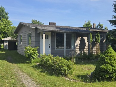 Beach Home For Sale in Alpena, Michigan