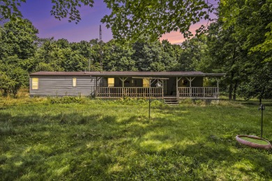 Beach Home Active Under Contract in Eau Claire, Michigan