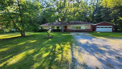 Beach Home For Sale in Ossineke, Michigan