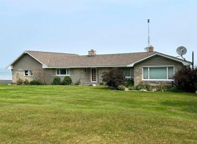 Beach Home For Sale in Cheboygan, Michigan