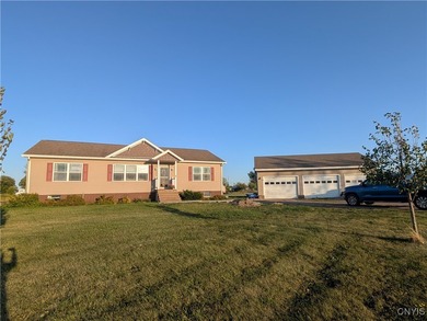 Beach Home Active Under Contract in Three Mile Bay, New York