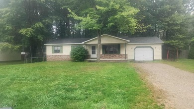 Beach Home For Sale in Oscoda, Michigan