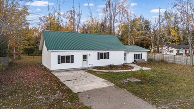 Beach Home For Sale in Cheboygan, Michigan