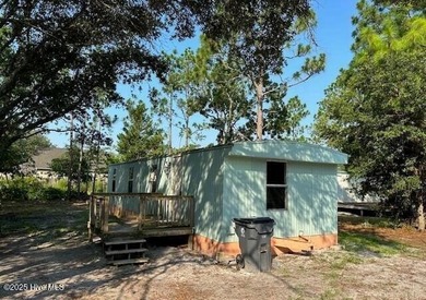 Income-producing rental with reliable tenants! This 2-bedroom - Beach Home for sale in Southport, North Carolina on Beachhouse.com