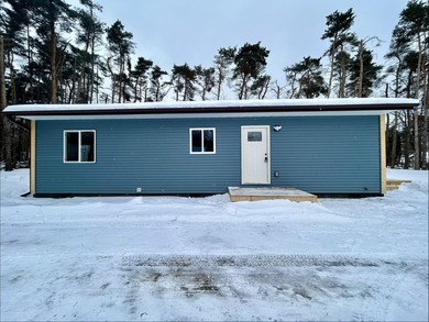 Beach Home Active Under Contract in Charlevoix, Michigan