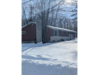 Beach Home For Sale in Alpena, Michigan