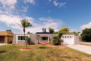 Beach Home For Sale in Holiday, Florida