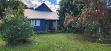 Beach Home For Sale in Hessel, Michigan