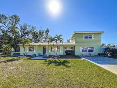 Beach Home For Sale in Kenneth City, Florida