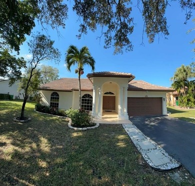 Beach Home For Sale in Coral Springs, Florida