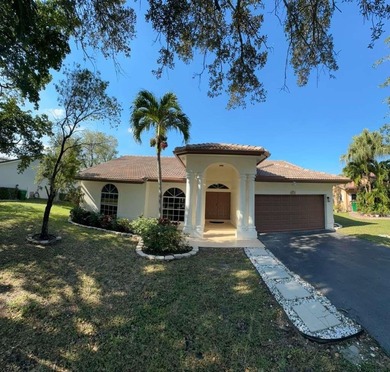 Beach Home For Sale in Coral Springs, Florida