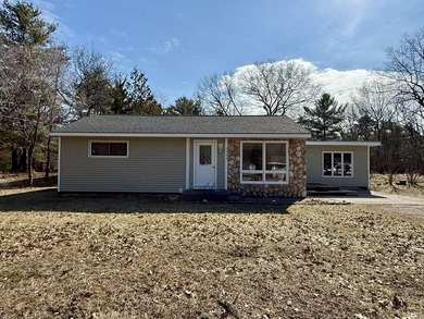 Beach Home For Sale in Oscoda, Michigan