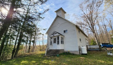 Beach Home Sale Pending in Alanson, Michigan