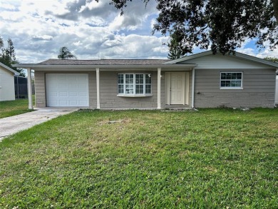 Beach Home For Sale in Holiday, Florida