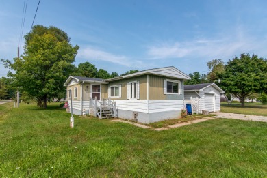 Beach Home Sale Pending in Tawas City, Michigan