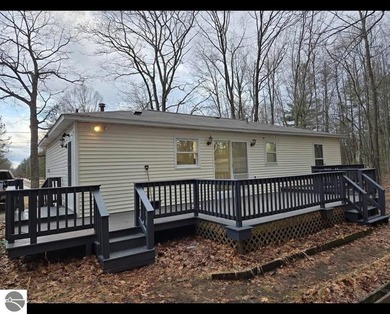 Beach Home For Sale in Oscoda, Michigan