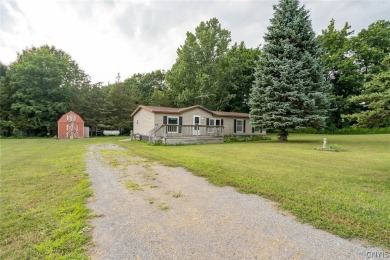 Beach Home For Sale in Henderson, New York