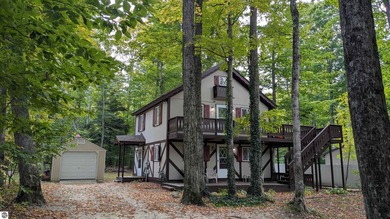 Beach Home For Sale in Cedar, Michigan