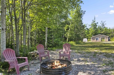 Beach Home For Sale in Ocqueoc, Michigan