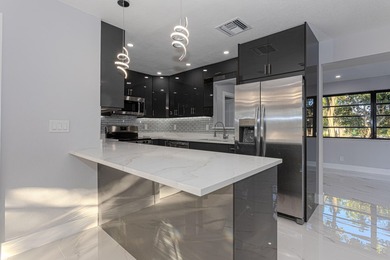 Beach Home For Sale in Palm Springs, Florida