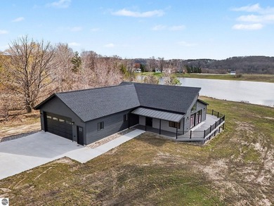 Beach Home For Sale in Ellsworth, Michigan