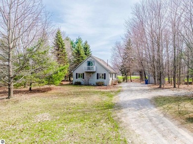 Beach Home Sale Pending in Cedar, Michigan