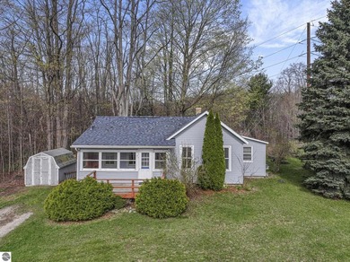Beach Home For Sale in Kewadin, Michigan