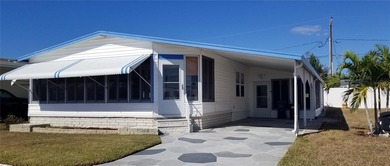 Beach Home For Sale in Holiday, Florida