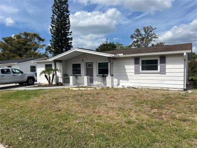 Beach Home For Sale in Holiday, Florida